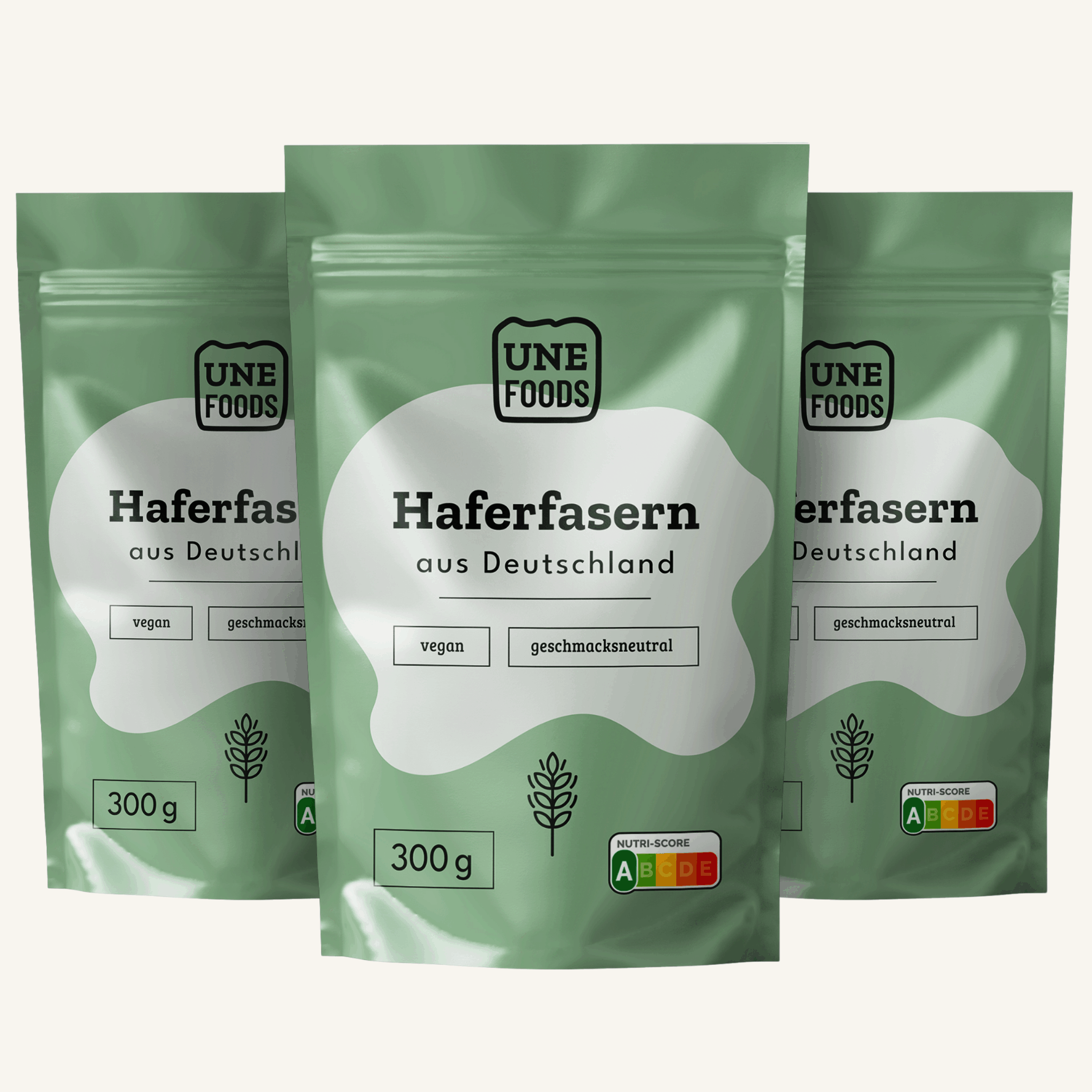 UNE FOODS Haferfasern aus Deutschland – lösliche Oat Fiber im grünen Standbeutel, Produktfoto mit drei Packungen.