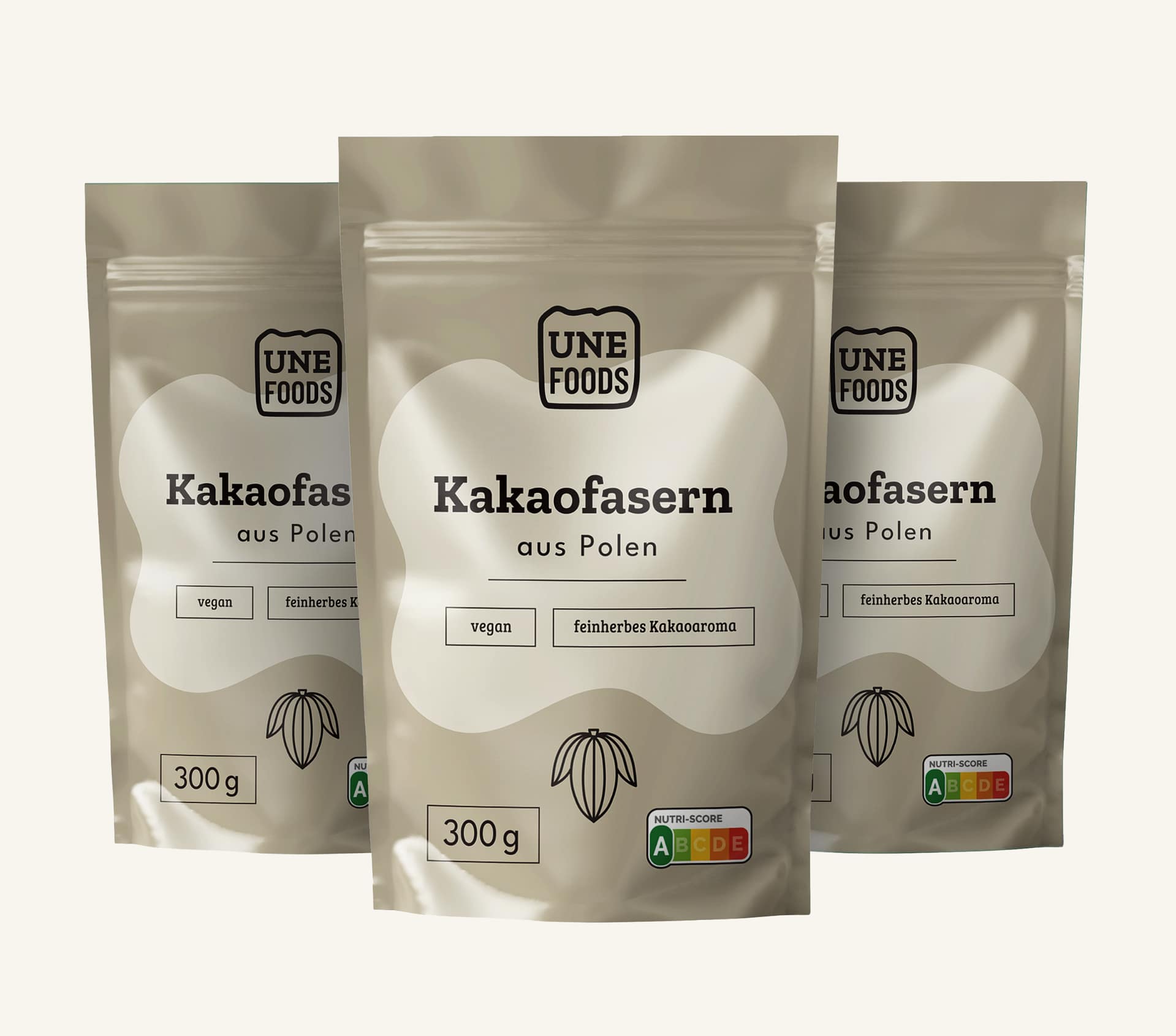 UNE FOODS Kakaofasern aus Polen – natürliche Cocoa Fiber im Standbeutel, Produktfoto mit drei Packungen.